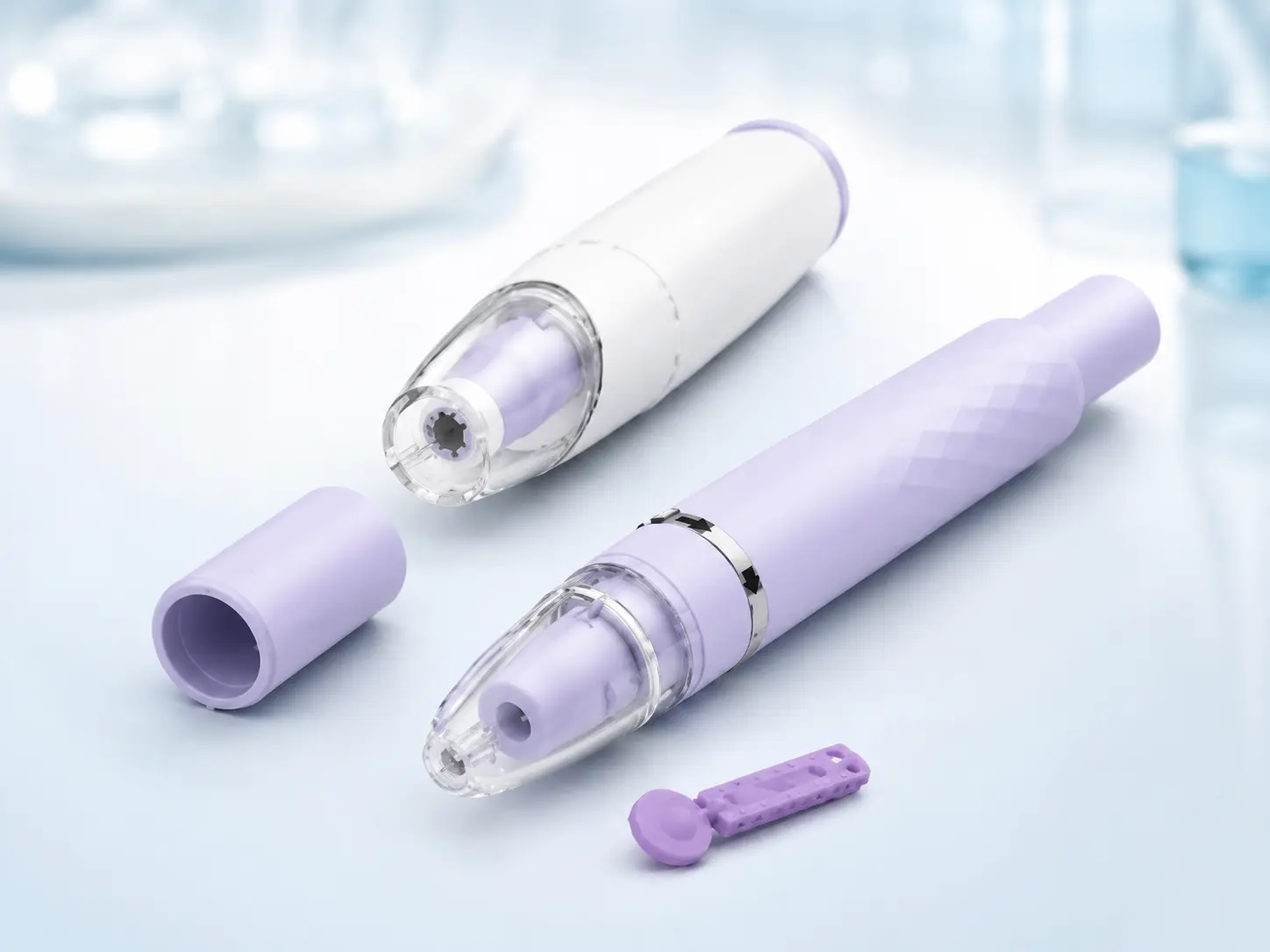 Reusable pen-style lancing devices with replaceable lancet components